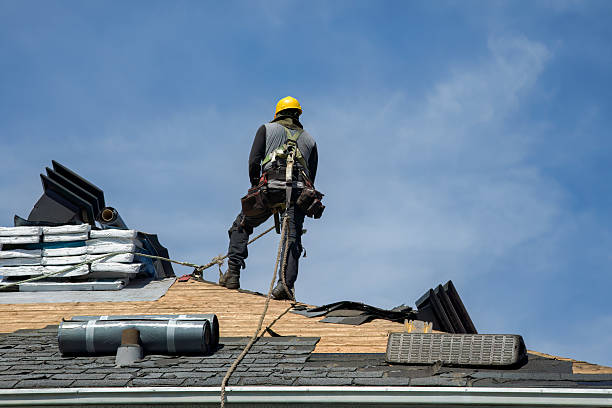 Professional Gutter Installation technician working in Farmingville, NY